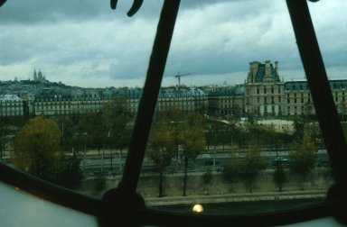 View towards Sacre Coeur through the clock of the Musée d'Orsay