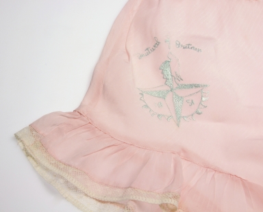 Pink knickers with lace trim and embroidered Festival symbol.